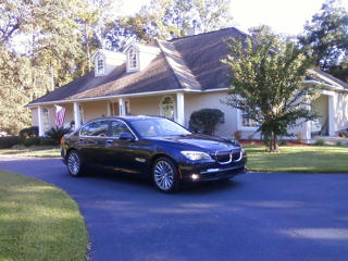 BMW in front of house